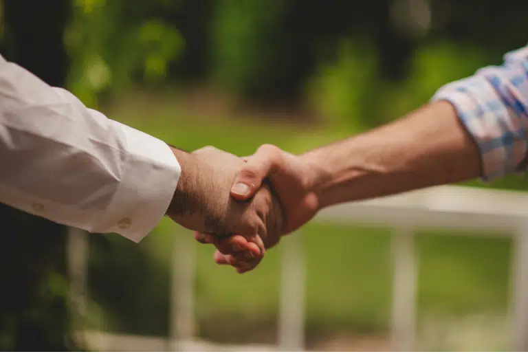 Two people shaking hands